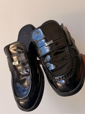 DKNY Black Patent Leather Slip-On Loafers with Metal Logo
